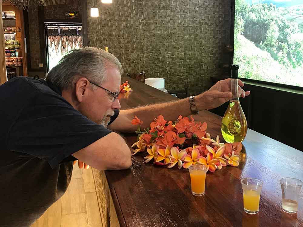 Stephen checking out the Liqueur Ananas (Pineapple Liquor) bottle.