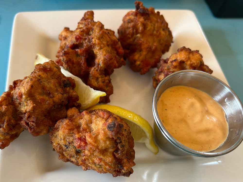 Conch fritters Swordfish Grill