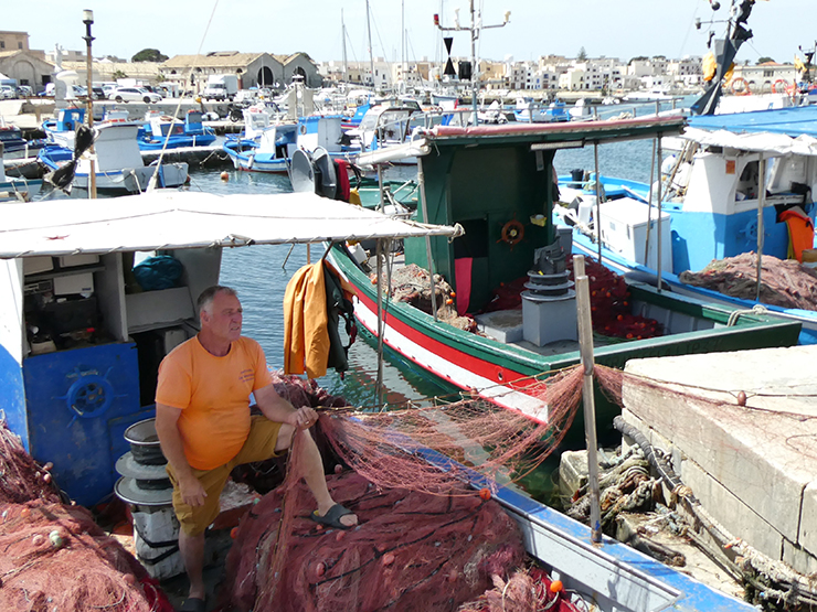 Fishermen with their nets on Favignana, Egadi Islands