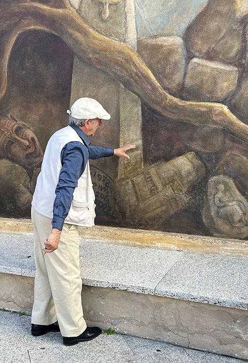 Artist explains meaning of a section of the mural